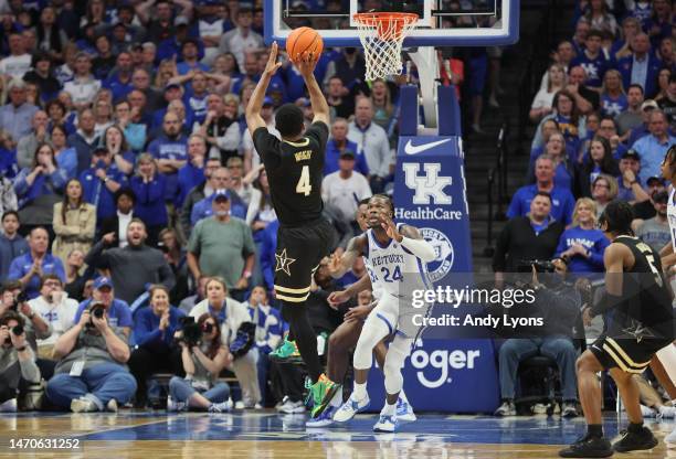 Jordan Wright of the Vanderbilt Commodores shoots the game winning shot in the 68-66 victory against the Kentucky Wildcats at Rupp Arena on March 01,...