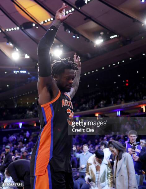 Julius Randle of the New York Knicks salutes the fans as he leaves the court after the game against the Brooklyn Nets at Madison Square Garden on...