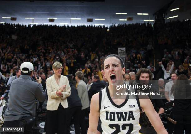 Guard Caitlin Clark of the Iowa Hawkeyes reacts after scoring a 3-pt basket at the buzzer to defeat the Indiana Hoosiers at Carver-Hawkeye Arena, on...