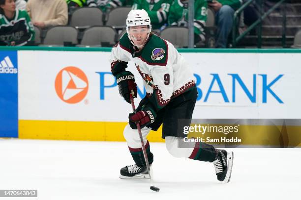 Clayton Keller of the Arizona Coyotes skates with the puck during the second period against the Dallas Stars at American Airlines Center on March 01,...