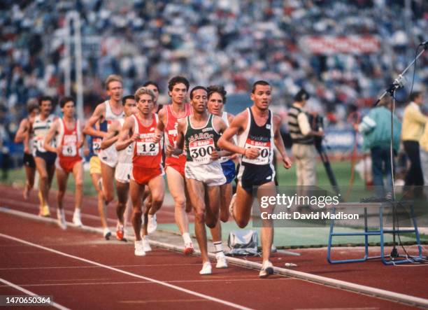 Said Aouita of Morocco, Gerard Donakowski of the USA, , Mark Nenow of the USA , and other runners compete in the Men's 10000 meters race at the...