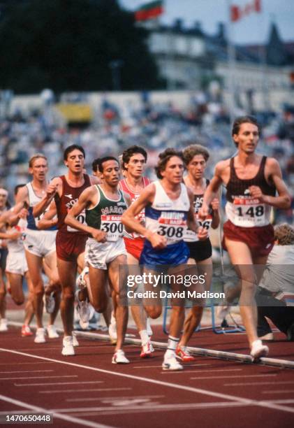 Mark Nenow of the USA , eventual winner Said Aouita of Morocco and other runners compete in the Men's 10000 meters race at the Bislett Games on July...