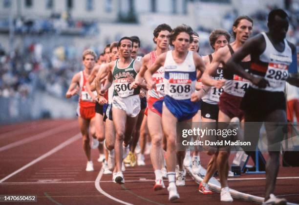 Said Aouita of Morocco, Mark Nenow of the USA, and other runners compete in the Men's 10000 meters race at the Bislett Games on July 5, 1986 at...