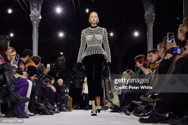 Model walks the runway during the Balmain Womenswear Fall Winter 2023-2024 show as part of Paris Fashion Week on March 01, 2023 in Paris, France.