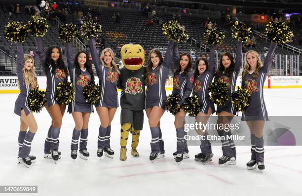 The Vegas Golden Knights mascot Chance the Golden Gila Monster and members of the Knights Guard, wearing specialty jerseys for the Vegas Golden...