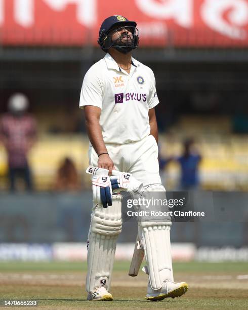 Rohit Sharma of India walks off after he was dismissed by Nathan Lyon of Australia during day two of the Third Test match in the series between India...