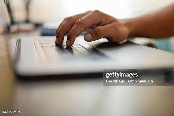 man's hands typing on the laptop - in time stock pictures, royalty-free photos & images