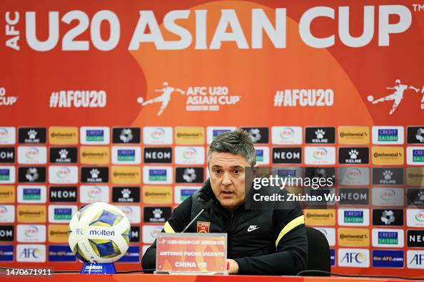 Coach Antonio Puche of China attends the pre-match press