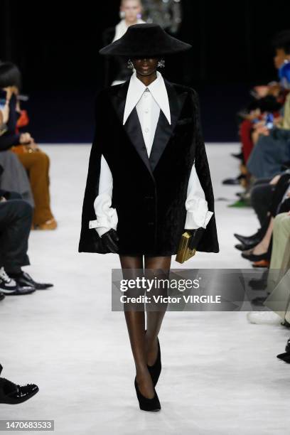 Model walks the runway during the Balmain Ready to Wear Fall/Winter 2023-2024 fashion show as part of the Paris Fashion Week on March 1, 2023 in...