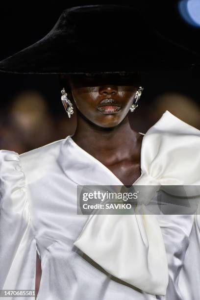 Model walks the runway during the Balmain Ready to Wear Fall/Winter 2023-2024 fashion show as part of the Paris Fashion Week on March 1, 2023 in...