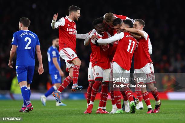 Gabriel Martinelli of Arsenal celebrates with teammates after scoring the team's second goal following the VAR check during the Premier League match...