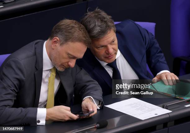 German Finance Minister Christian Lindner and Economy and Climate Action Minister Robert Habeck attend a session of the Bundestag in which German...
