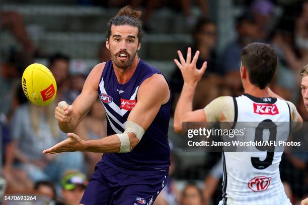 Alex Pearce of the Dockers handballs the ball during the AFL Practice Match between the Fremantle Dockers and the Port Adelaide Power at Fremantle...