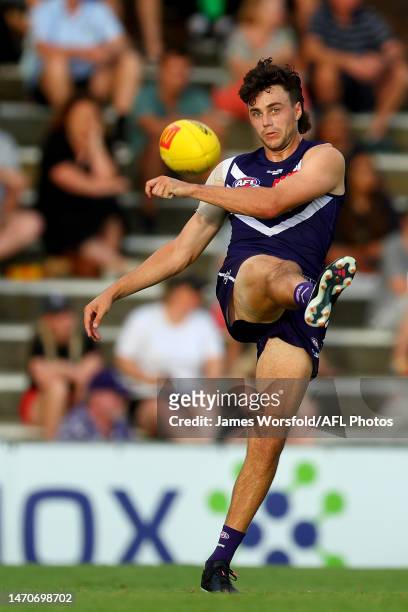 Jordan Clark of the Dockers kicks the ball across the field during the AFL Practice Match between the Fremantle Dockers and the Port Adelaide Power...