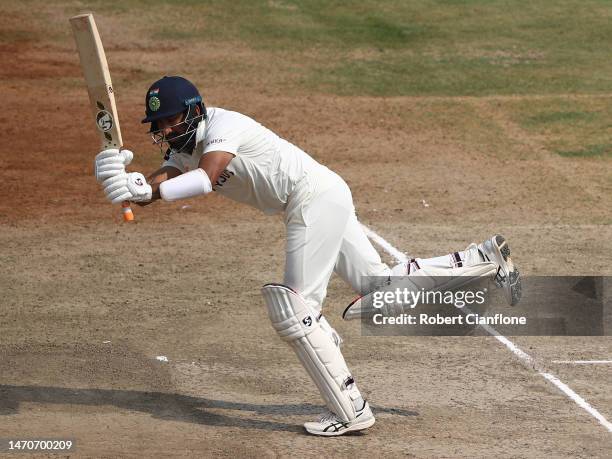 Cheteshwar Pujara of India bats during day two of the Third Test match in the series between India and Australia at Holkare Cricket Stadium on March...