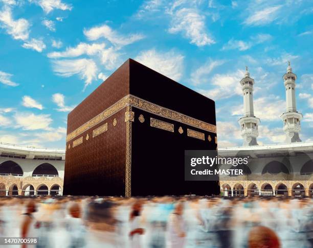 crowd slow motion people walking around kaaba - hajj ストックフォトと画像