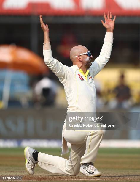 Nathan Lyon of Australia appeals unsuccessfully for the wicket of Axar Patel of India during day two of the Third Test match in the series between...