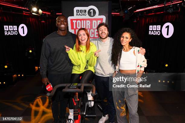 Radio presenter Arielle Free is seen here with Paul Olima, Jordan North and Vick Hope in the BBC Radio 1 studio on a exercise bike in preparation for...