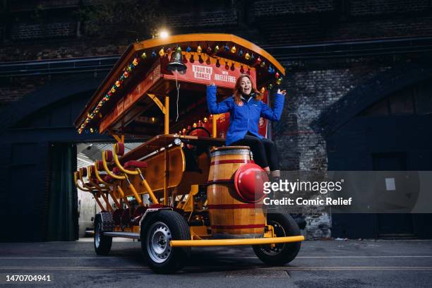 Radio presenter Arielle Free poses with the bike that she will be using in her Red Nose Day 2023 challenge, 'Tour De Dance' on March 1, 2023 in...