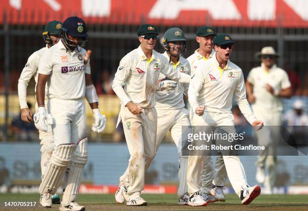 Steve Smith of Australia celebrates taking a catch to dismiss Cheteshwar Pujara of India during day two of the Third Test match in the series between...