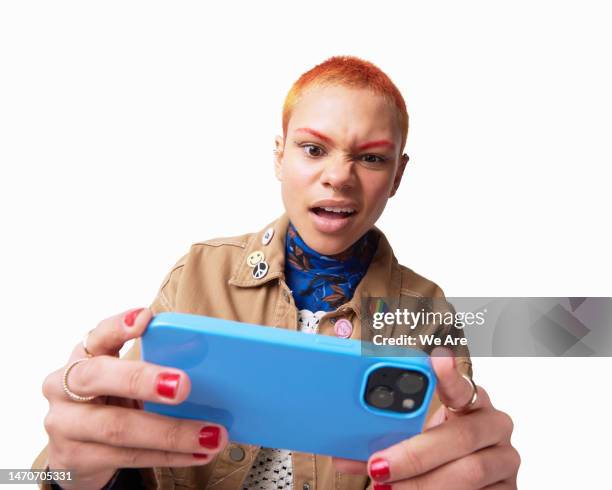 smartphone gaming - gemengde signalen uitzenden stockfoto's en -beelden