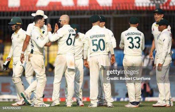 Nathan Lyon of Australia celebrates taking the wicket of Umesh Yadav of India during day two of the Third Test match in the series between India and...