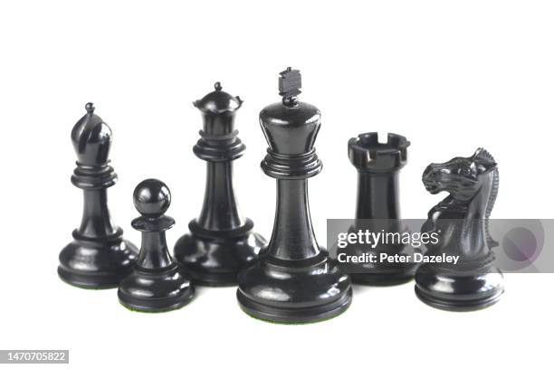 black chess team - rook chess piece stock pictures, royalty-free photos & images