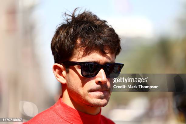 Charles Leclerc of Monaco and Ferrari looks on in the Paddock during previews ahead of the F1 Grand Prix of Bahrain at Bahrain International Circuit...