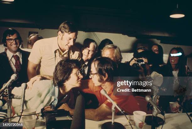 Tennis players Billie Jean King and Bobby Riggs get ready to kiss and make up during a press conference following the 'Battle of the Sexes' match at...