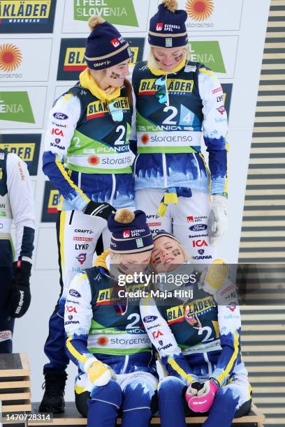 Bronze medalists Emma Ribom, Ebba Andersson, Frida Karlsson and Maja Dahlqvist of Team Sweden look dejected during the victory ceremony for the...