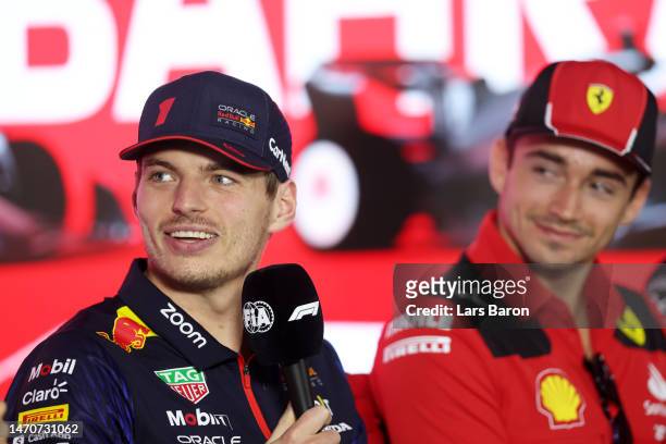 Max Verstappen of the Netherlands and Oracle Red Bull Racing and Charles Leclerc of Monaco and Ferrari attend the Drivers Press Conference during...