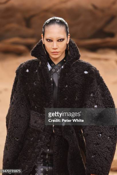 Model, beauty detail, walks the runway during the Off-White Womenswear Fall Winter 2023-2024 show as part of Paris Fashion Week on March 02, 2023 in...