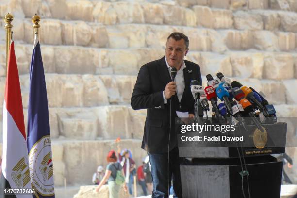 Egypt's Minister of Tourism and Antiquities Ahmed Issa gives a news conference in front of Khufu pyramid on March 2, 2023 in Giza, Egypt. The...