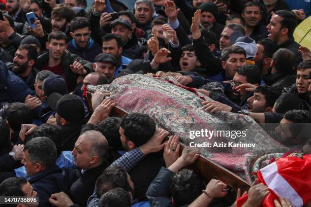 People attend the funeral of the Imam-jamaat of the mosque "Meshedi Dadash" Haji Shahin Hasanli on March 2, 2023 in Baku, Azerbaijan. Haji Shahin...