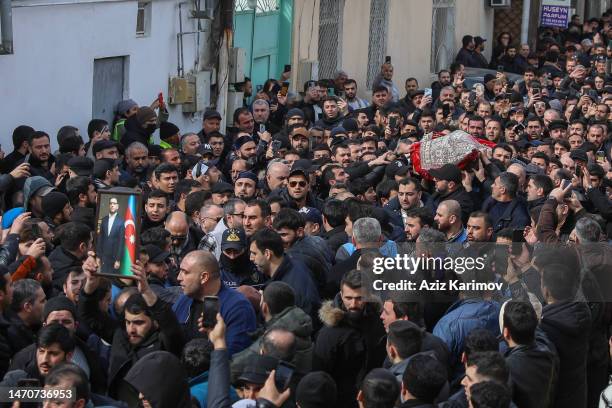 People attend the funeral of the Imam-jamaat of the mosque "Meshedi Dadash" Haji Shahin Hasanli on March 2, 2023 in Baku, Azerbaijan. Haji Shahin...