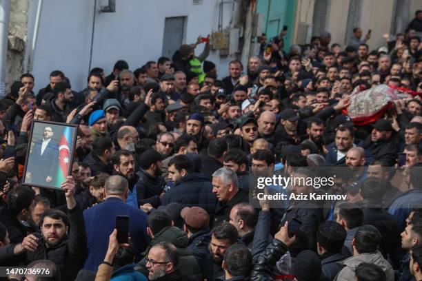 People attend the funeral of the Imam-jamaat of the mosque "Meshedi Dadash" Haji Shahin Hasanli on March 2, 2023 in Baku, Azerbaijan. Haji Shahin...