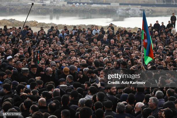 People attend the funeral of the Imam-jamaat of the mosque"Meshedi Dadash" Haji Shahin Hasanlion March 2, 2023 in Baku, Azerbaijan. Haji Shahin...