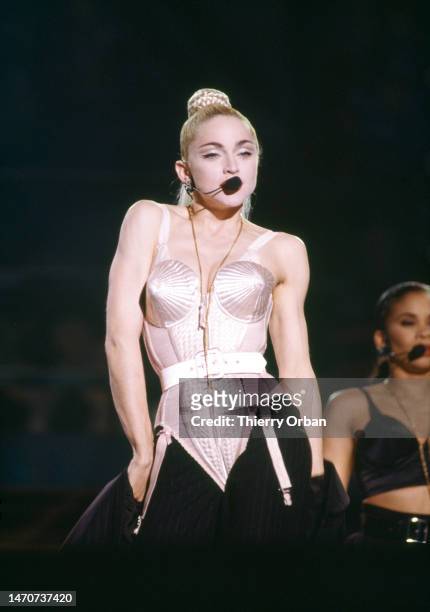 Madonna in concert in Tokyo, Japan. She wears the famous outfit designed by Jean-Paul Gaultier.