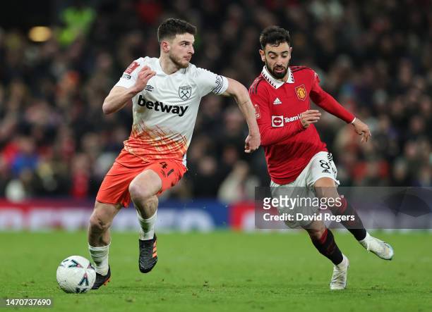 Declan Price of West Ham United takes on Bruno Fernandez during the Emirates FA Cup fifth round match between Manchester United and West Ham United...