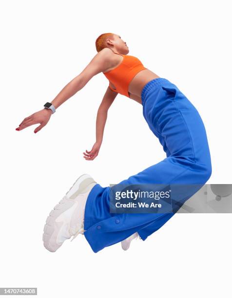 jumping - fashion concept stock pictures, royalty-free photos & images