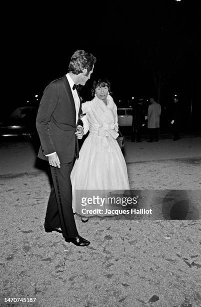 French Fashion Designer Coco Chanel and her friend Jacques Chazot attend a party at restaurant Maxim's in Paris.