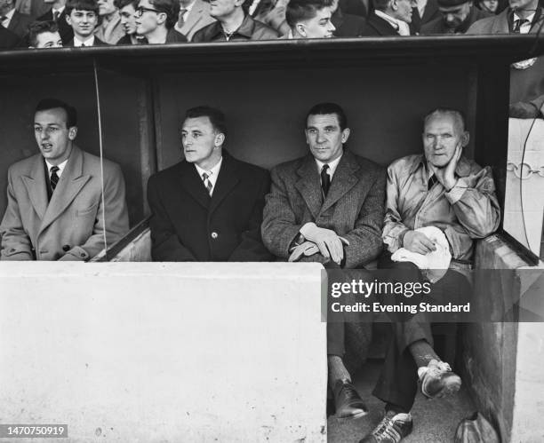 British footballer John Sillett, British footballer Tommy Docherty, British football manager Ted Drake, and British coach Jack Oxberry sitting in the...