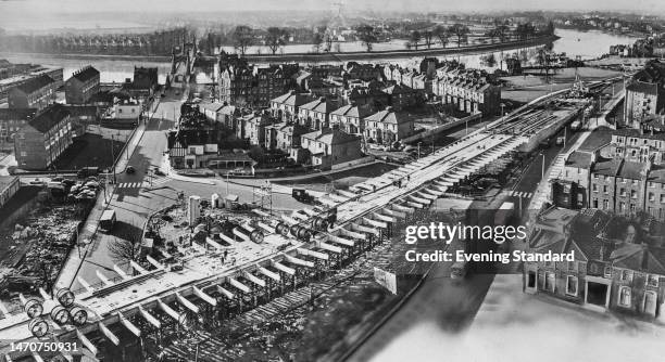 High-angle view of the Hammersmith flyover under construction in Hammersmith, west London, England, 7th February 1961. Designed by Peter Wroth, the...