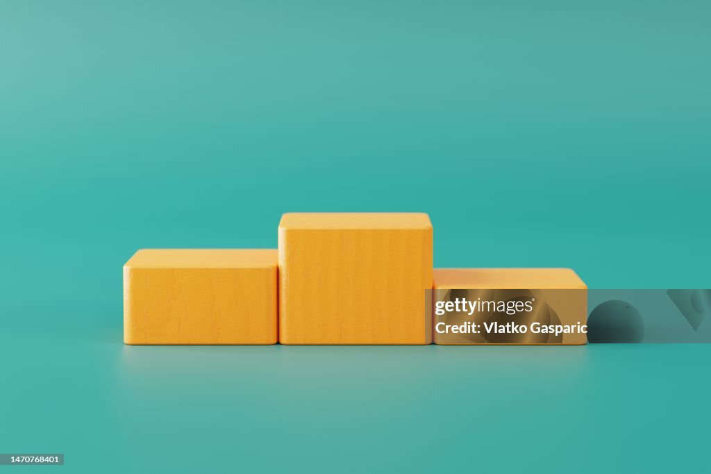Winners podium against minimal background