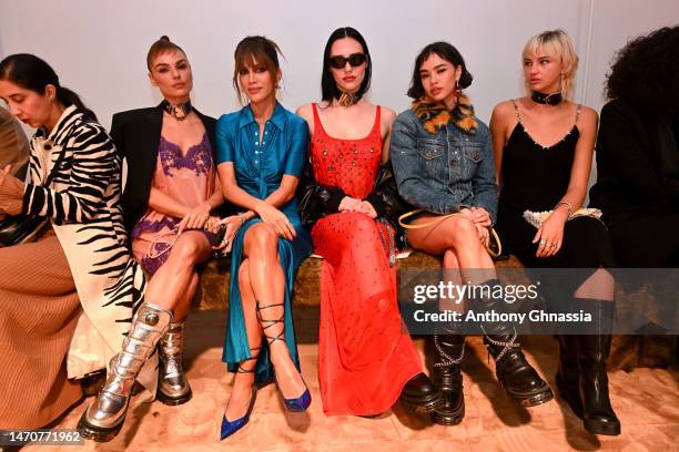 Isis Valverde, Camilla Coelho, Sydney Carlson, Edie Rose and Mia Regan attend the Paco Rabanne Womenswear Fall Winter 2023-2024 show as part of Paris...