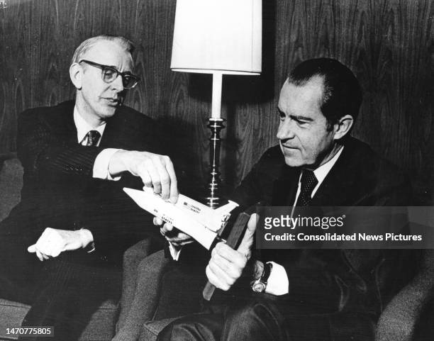 Administrator Dr James C Fletcher explains a model of a proposed space shuttle vehicle to US President Richard M Nixon , San Clemente, California,...