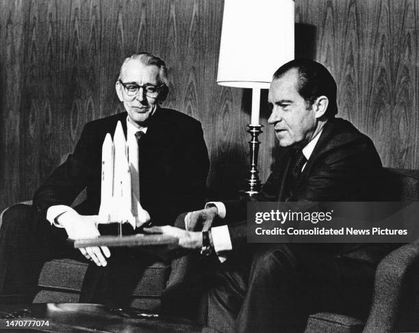 Administrator Dr James C Fletcher explains a model of a proposed space shuttle vehicle to US President Richard M Nixon , San Clemente, California,...