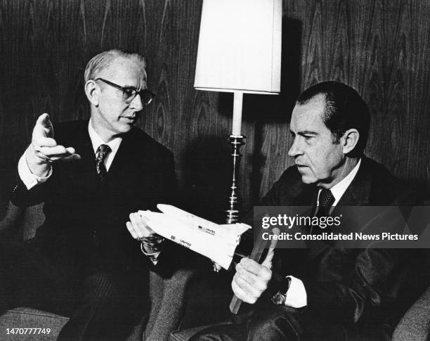 Administrator Dr James C Fletcher explains a model of a proposed space shuttle vehicle to US President Richard M Nixon , San Clemente, California,...