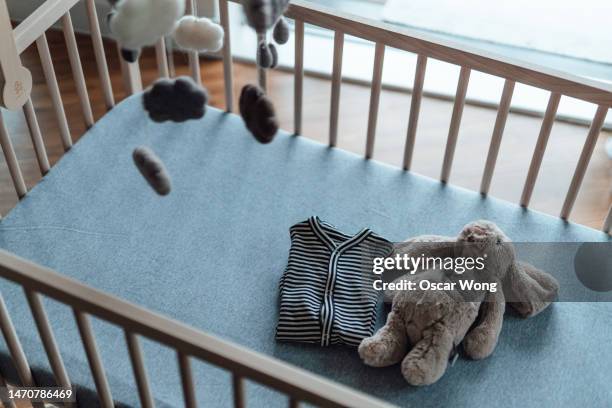 expecting a new life - baby cot stock pictures, royalty-free photos & images