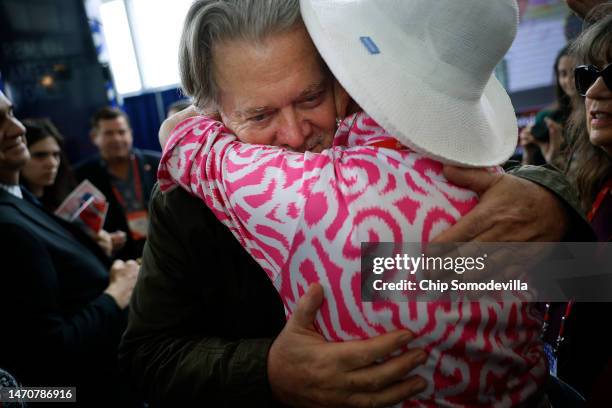 Steve Bannon, former advisor to former President Donald Trump and right-wing media executive, embraces a supporter during the Conservative Political...